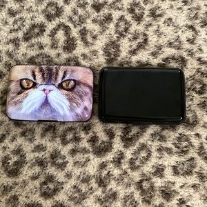 One black aluma wallet and one generic cat wallet (both are hard cases)